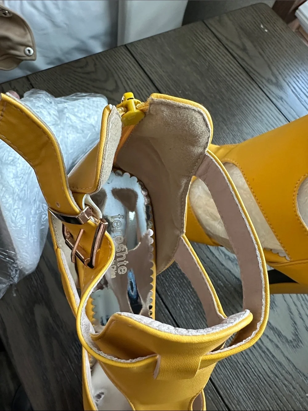 Fereshte mustard yellow peep toe high heel ankle booties.